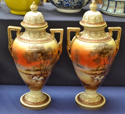 Lot 313 - A pair of Noritake twin handled vases and covers