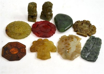 Lot 326 - A collection of eight jade and hardstone okimono and a pair of fo dogs