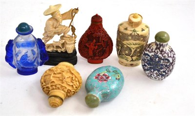 Lot 327 - A collection of six Chinese snuff bottles and a small figure of a fisherman