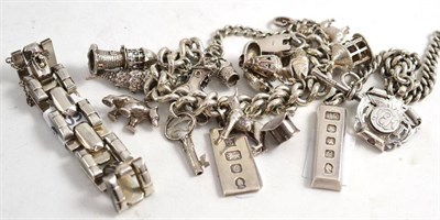 Lot 330 - A silver charm bracelet, a silver fob and ingot on chain and a Continental gate link bracelet