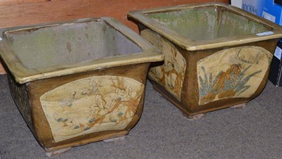 Lot 347 - A pair of Japanese stoneware planters/jardinieres of square section decorated with birds...