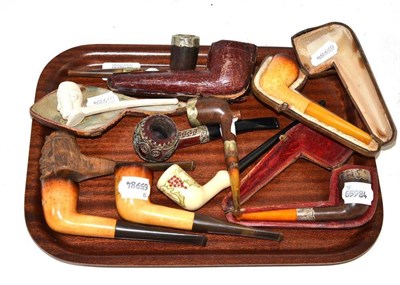 Lot 349 - Eleven assorted pipes, some with silver mounts