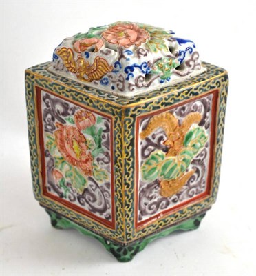 Lot 369 - A Chinese porcelain vase with pierced cover and enamelled decoration of flowers and scrolls