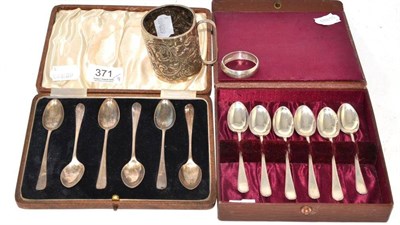 Lot 371 - Two sets of silver teaspoons, a Victorian silver mug and a napkin ring