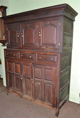 Lot 473 - An 18th century oak court cupboard