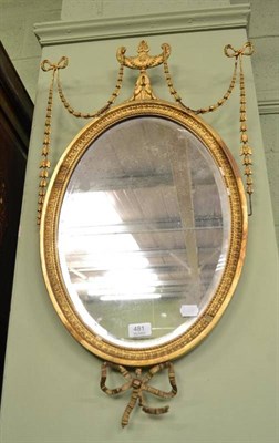 Lot 481 - A 19th century gilt and gesso oval wall mirror