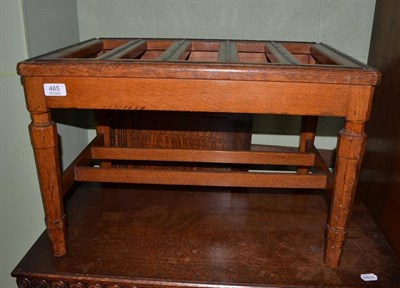 Lot 485 - Victorian oak luggage stand with octagonal legs and brass mounts