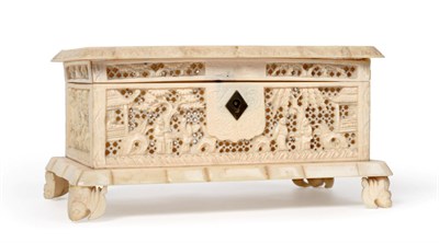 Lot 159 - A Cantonese Ivory Casket, mid 19th century, the hinged cover carved with a vacant cartouche and...