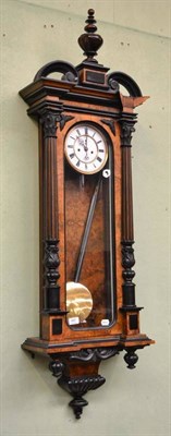 Lot 491 - A double weight driven Vienna type wall clock