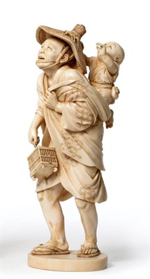 Lot 165 - A Japanese Ivory Okimono, Meiji period, as a man carrying a cricket cage, a boy reaching for a...