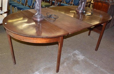 Lot 530 - A 19th century mahogany D-end dining table