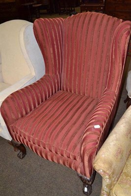 Lot 533 - Upholstered wing armchair