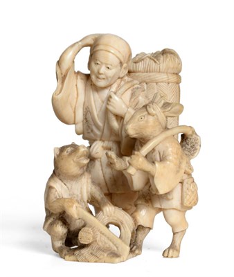 Lot 170 - A Japanese Ivory Netsuke, Meiji period, carved with a scene from the Kachi-Kachi Yama legend,...