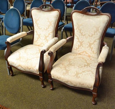 Lot 540 - Pair of cream damask open armchairs