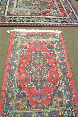 Lot 551 - Machine made carpet of Caucasian design, 290 by 195cm, together with a machine made rug (2)