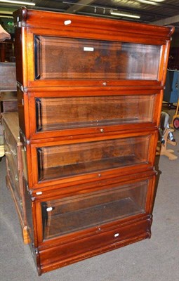 Lot 558 - A four tier Globe Wernicke bookcase