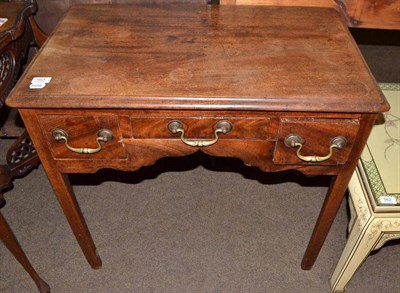 Lot 563 - Georgian mahogany lowboy with three drawers