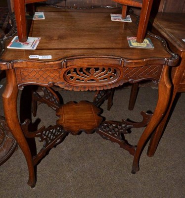 Lot 564 - A Georgian mahogany demi lune fold over card table and bow front side table