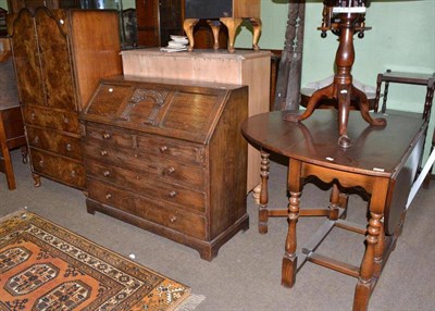 Lot 575 - An Art Deco cabinet, an oak bureau, a pot cupboard and an oak gateleg table