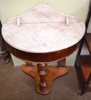 Lot 584 - A small marble topped washstand