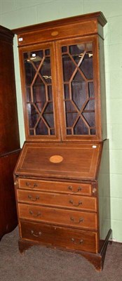 Lot 590 - An Edwardian mahogany bureau bookcase