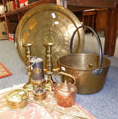 Lot 650 - Collection of copper and brass including a miner's lamp, pair of ejector candlesticks, jam pan,...