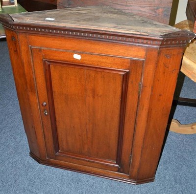 Lot 679 - A mahogany straight fronted corner cupboard