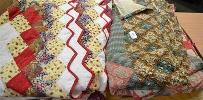 Lot 683 - Victorian patchwork quilt (a.f.), two modern cotton patchwork quilts, white brocade bed cover,...