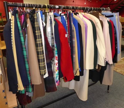 Lot 689 - A large quantity of modern clothing including wool coats, checked skirt and separates including...