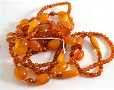 Lot 2 - Two strands of amber beads