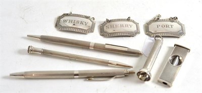 Lot 27 - Three silver pencils, three silver labels, cigar cutter and cigar piercer