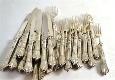 Lot 40 - Set of twelve silver fruit knives and forks