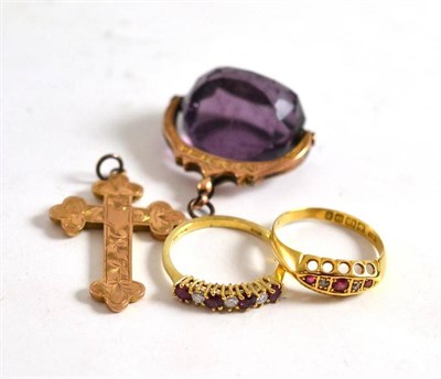 Lot 62 - Two gem set gold rings, a gold mounted swivel fob and a gold crucifix