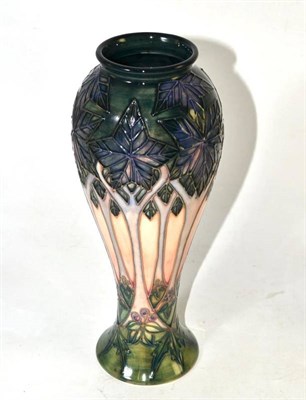Lot 68 - A William John Moorcroft Cluny pattern vase, 27cm high