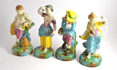 Lot 72 - Set of four Continental Maiolica pottery figures of the seasons