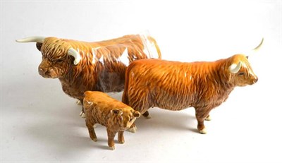 Lot 79 - A Beswick Highland bull, cow and calf