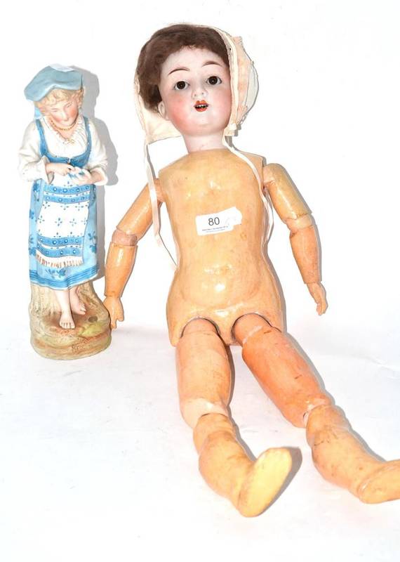 Lot 80 - German bisque socket head doll on composition jointed body and bisque figure of a young girl