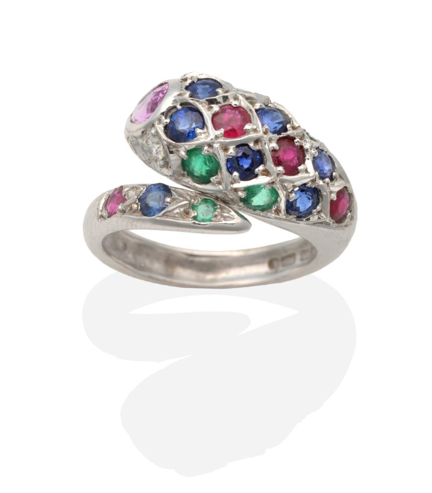 Lot 299 - An 18 Carat White Gold Multi-Gemstone Snake Ring, inset with round cut emeralds, sapphires, rubies