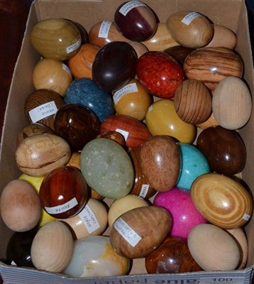Lot 100 - Collection of assorted decorative wooden and marble eggs