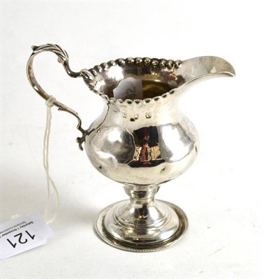 Lot 121 - A George III silver helmet cream jug, London 1778