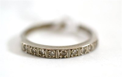 Lot 149 - An 18ct white gold and diamond half eternity ring