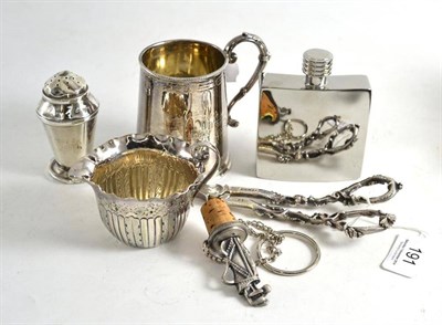 Lot 191 - A pair of silver grape scissors, a pepperette, a plated mug, a small cream jug and a hip flask