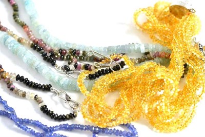 Lot 193 - A tanzanite bead necklace, an aquamarine bead necklace, a citrine bead necklace, a mixed colour...