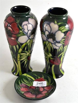 Lot 246 - A pair of modern Moorcroft anemone vases (seconds, one with minor chip) together with a similar...
