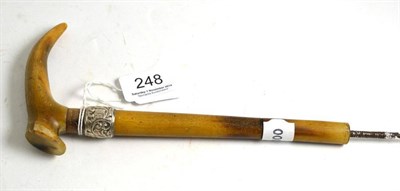 Lot 248 - A Victorian silver mounted walking stick handle and upper shaft, London 1889, 24.5cm long overall