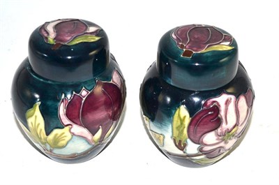 Lot 254 - Pair of modern Moorcroft small ginger jars and covers