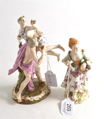 Lot 269 - A late Meissen porcelain Classical figure group and another of a girl with a basket of grapes...