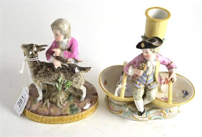 Lot 281 - A late Meissen porcelain figure of a boy with a goat and a late Meissen figural candlestick as...
