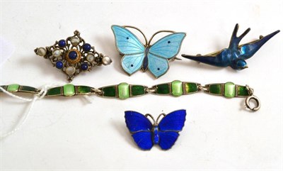 Lot 4 - A quantity of enamelled brooches and a bracelet