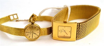Lot 9 - A lady's 18ct gold Tissot wristwatch, and another lady's 18ct gold Tissot wristwatch with...